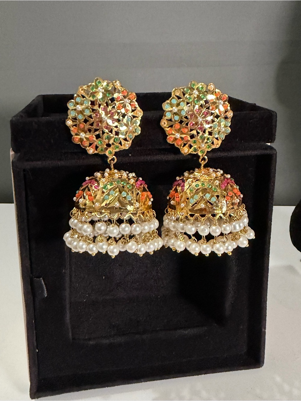 Gold plated Jhumka Earrings with Multicolor Stones and Pearl Drops